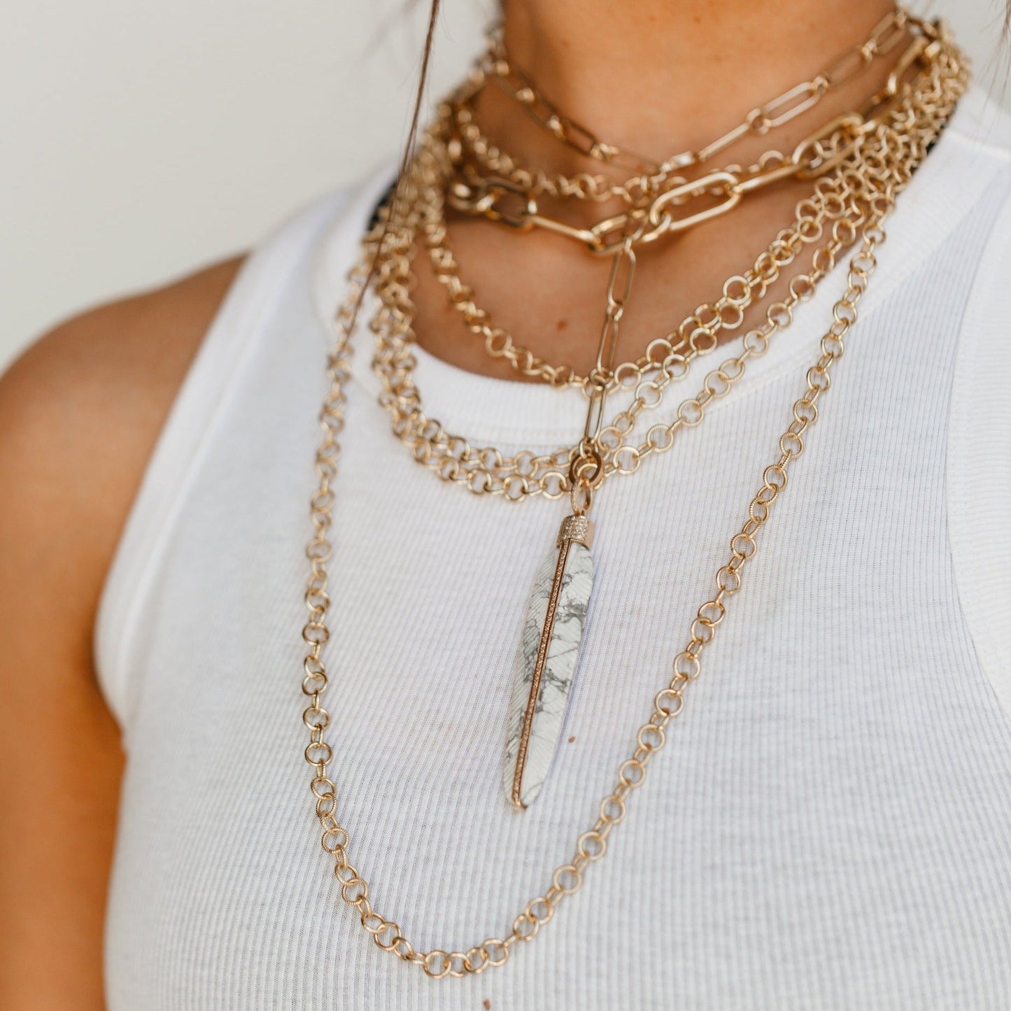 14k Carved Howlite Feather Pendant