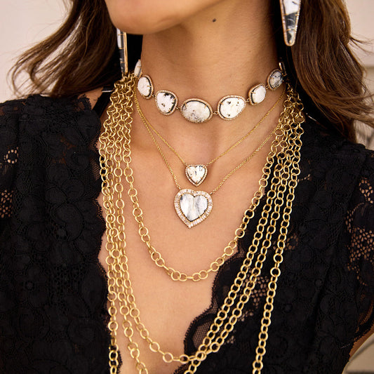 14k White Buffalo Baguette Heart Necklace